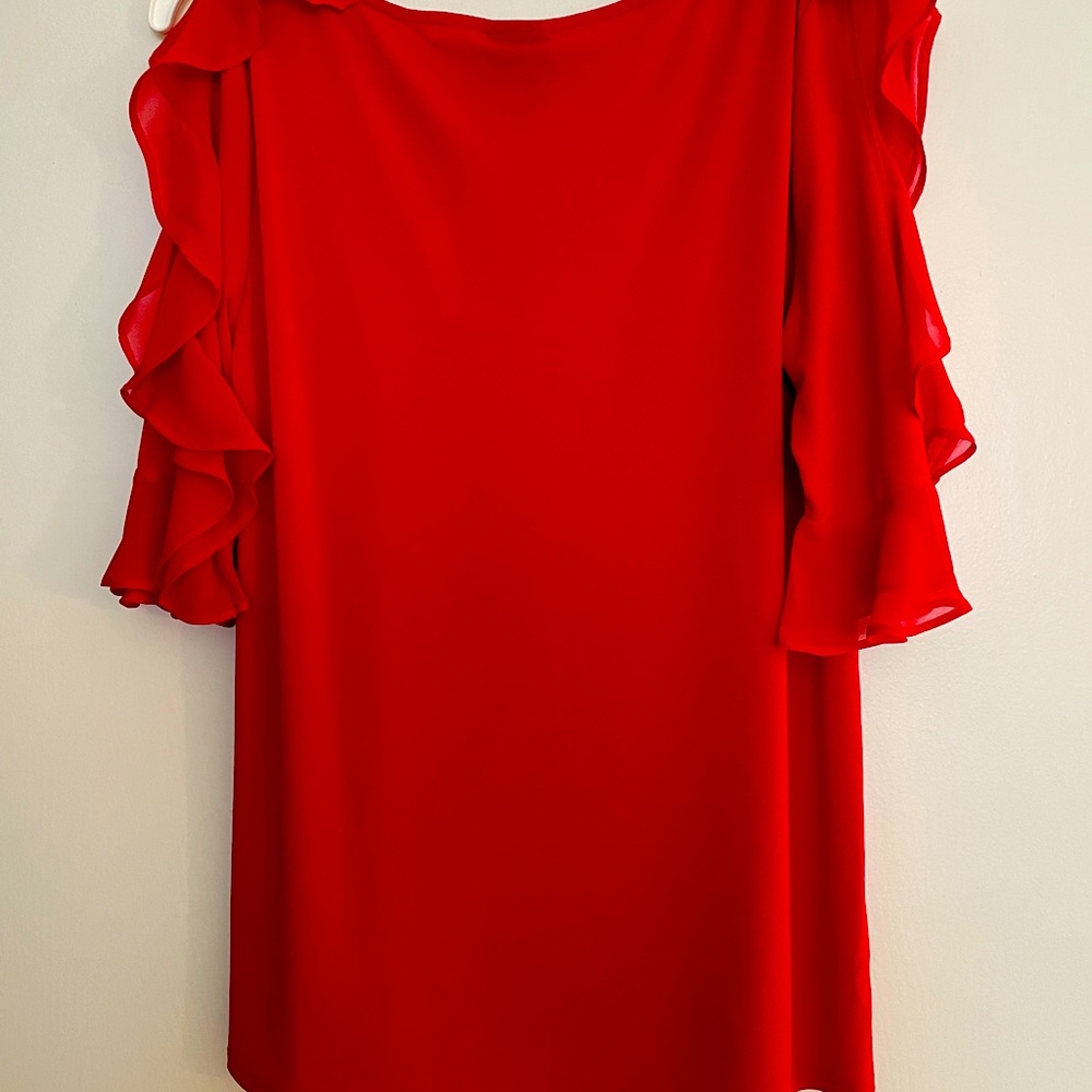 A red polyester blouse